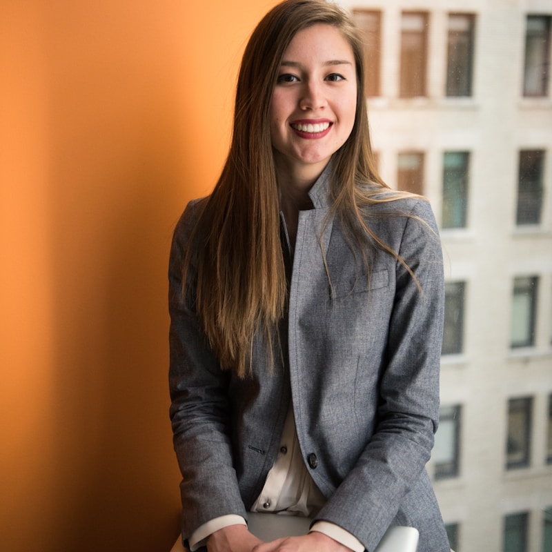 Person displaying confident and open body language in social setting